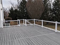 <b>Trex Transcend Island Mist Deck Boards with White Washington Vinyl Railing and Black Round Aluminum Balusters in Glenwood, MD 2</b>